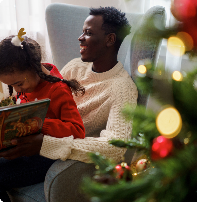 Father and Daughter reading a book